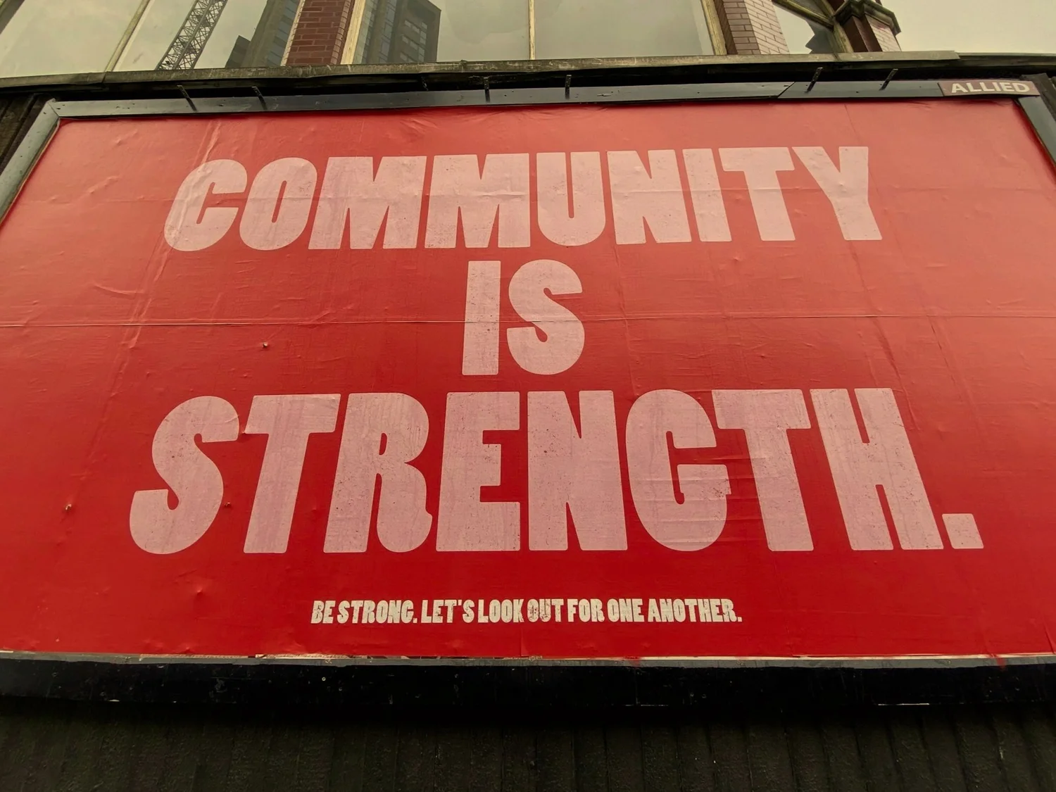 Community is strength billboard